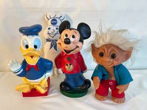 Donald Duck & Mickey Mouse piggybanks, Pillsbury Dough Boy, and a big Troll