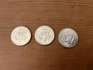three JFK half-dollars, 1964, in beautiful condition