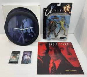 lot 7 image: The X Files Misc. Collectibles Including 1998 The X Files Series 1 Action Figure NIB, Clock And More
