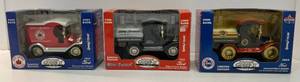 lot 29 image: Group Of Gearbox Toy Brand Gasoline Advertisement Die-Cast Vehicle Banks NIB