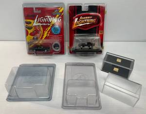 lot 30 image: Vintage Johnny Lightnings In Protective Case NIB And Protective Cases