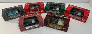 lot 42 image: Group Of Gearbox Toys Brand Miniature Die-Cast Cars Some With Gasoline Advertisement NIB