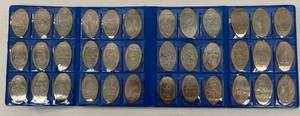 lot 60 image: Group Of Disney Stretched Souvenir Quarters