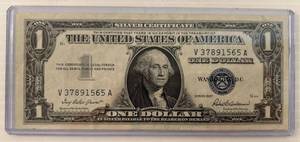 lot 77 image: 1957 1 Dollar Silver Certificate In Protective case