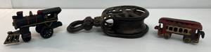 lot 112 image: Group Of Vintage Cast Iron Items Including Train And Pulley