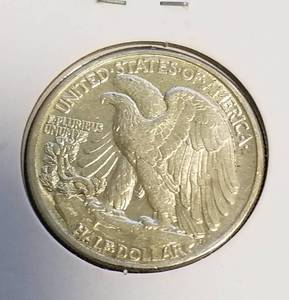 1942 WALKING LIBERTY HALF DOLLAR IN HIGHER GRADE