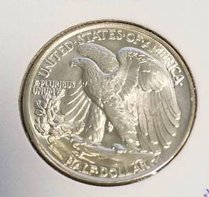 1943 WALKING LIBERTY HALF DOLLAR IN HIGHER GRADE
