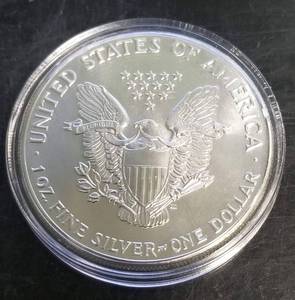 1986 AMERICAN SILVER EAGLE 1 TROY OZ .999 FINE SILVER IN AIRTITE