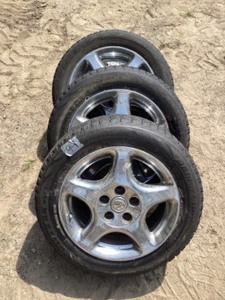 lot 94 image: Bridgestone tires on rims