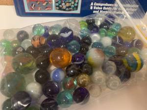 lot 56 image: Marbles, Book, Kaleidoscope