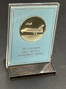 lot 24 image: The Columbia Space Shuttle Sterling Silver Limited Edition Medal