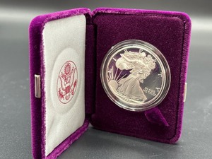 lot 28 image: 1990 One Ounce Silver Bullion Coin Proof
