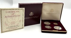 lot 33 image: United States Olympic Proof Coin Set Atlanta Centennial Olympic Games