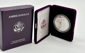lot 34 image: 1990 American Eagle One Ounce Silver Bullion Coin