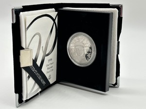lot 18 image: 1999 American Eagle One Ounce Platinum $100 Coin