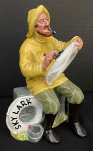 lot 45 image: A Good Catch and The Boatman Royal Doulton Figurines