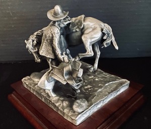 lot 101 image: Chilmark Cold Saddles, Mean Horses Fine Pewter Statue by Donald Polland