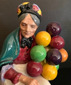 lot 105 image: Royal Doulton The Old Balloon Seller and The Balloon Man Figurines