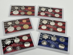 lot 254 image: (2) 2005 United States Mint Coin Proof Sets and (2) 2005 State Quarter Proof Sets