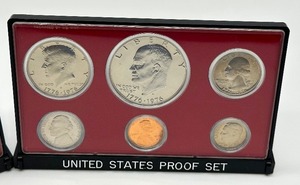 lot 249 image: (2) United States 1975 Coin Proof Sets