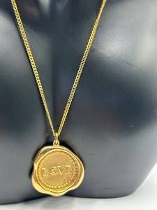 lot 285 image: 14k Gold Necklace with Love Pendant