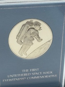 lot 400 image: Franklin Mint The First Untethered Space Walk Eyewitness Commemorative Sterling Silver Medal