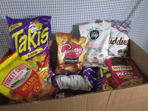 lot 42 image: (A-4T) Box Full of Assorted Bag Chi...