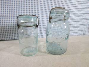 lot 244 image: (CNTR) 2 Vintage Glass Jars with Gl...