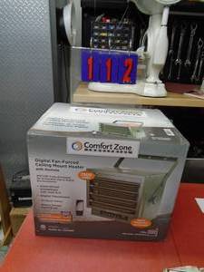 New Comfort Zone 7500 w 220 v 25600 btu with remote. New in box. As shown. THIS ITEM HAS A RESERVE.
