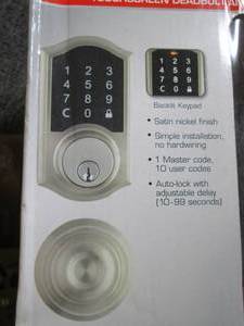 defiant touchscreen deadbolt and kn...