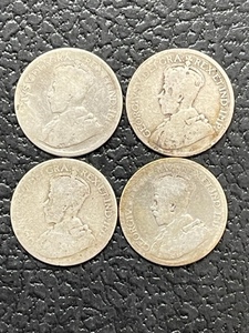 4 Silver Canadian Quarters