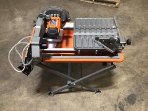 RIDGID9 Amp Corded 7 in. Wet Tile Saw with Stand Customer returns in working conditions