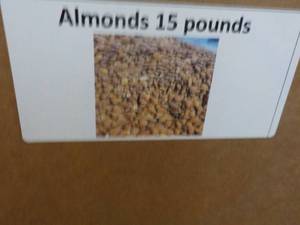 lot 206 image: 15 lb. Box Almonds...
