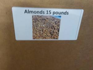 lot 208 image: 15 lb. Box Almonds...