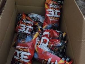 lot 213 image: Case of 8 - 7 14 oz Bags Doritos 3...