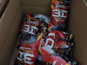 lot 214 image: Case of 8 - 7 14 oz Bags Doritos 3...