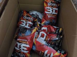 lot 216 image: Case of 8 - 7 14 oz Bags Doritos 3...