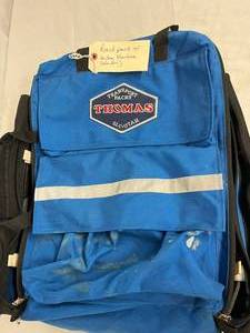 lot 25 image: Thomas Transport Packs  EMS Backpack Trauma Bag Blue With Multiple Colored Organizer Bags - Has Wear To Outside Otherwise Great Condition No Suction Machine Included