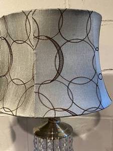 lot 31 image: Two Clear Lamp Bases with TealBrown Shades