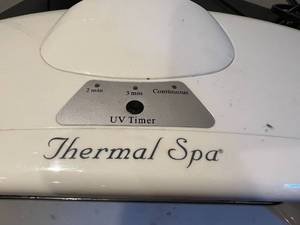 lot 61 image: Self Care Lot Massagers, UV Nail Lamp