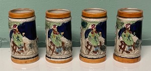 lot 219 image: Four Vintage Small Steins