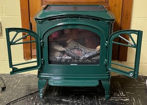 lot 243 image: Heat-N-Glow Cast Iron Electric Fireplace