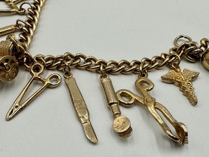 lot 279A image: Unique Vintage Medical Themed Charm Bracelet