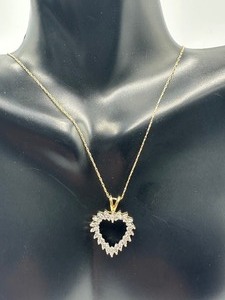 lot 276 image: 10k Necklace with Heart Shaped Pendant