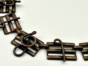 lot 39 image: Fun Vintage Musical Note Themed Necklace