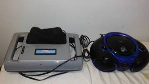 lot 8 image: CONAIR Massager, Jensen AMFM Cd Player  Like New  Both Work Great