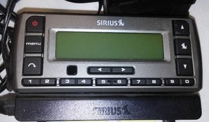 lot 192 image: Electronic Misc. Sirius connector, old phones, breaker strips and more.