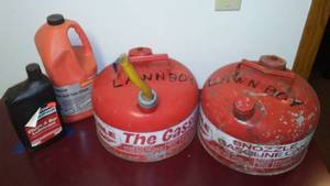 lot 222 image: Gas Cans and Chain Saw Oil