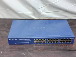 lot 58 image: NetGear ProSafe 24 Port 10100 Switch