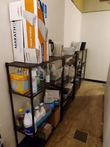 Four Shelving Units And Contents